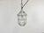 Induatrial cage pendant light made by Yamada Co.Ltd. in Japan during the 1960s. It features a cast aluminium body and a...