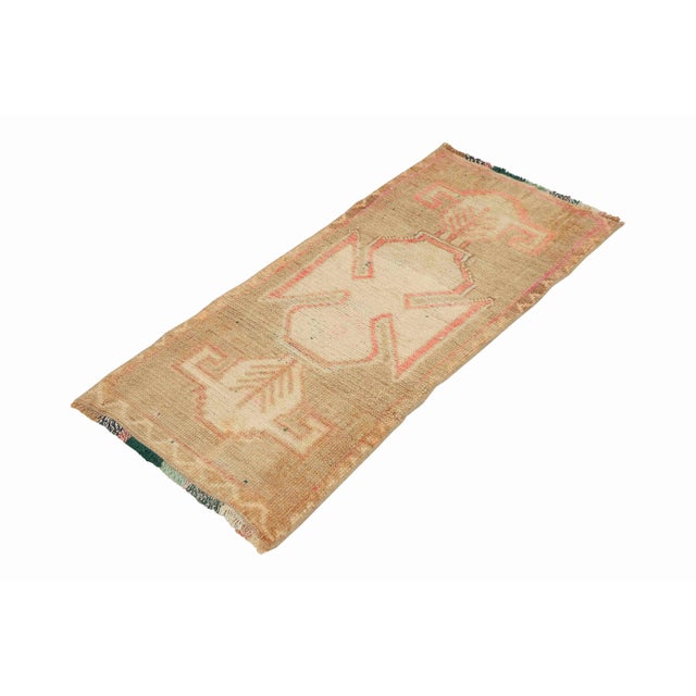 Vintage Handknotted decorative mini rug from Kars region of Turkey. Approximately 45-55 years old. In very good condition.