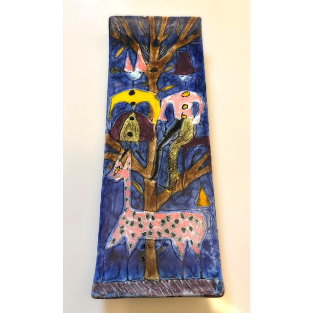 Offered is a unique wall plate with a hand-painted motif by Elio Schiavon, signed by the artist, from the 1960s. This...