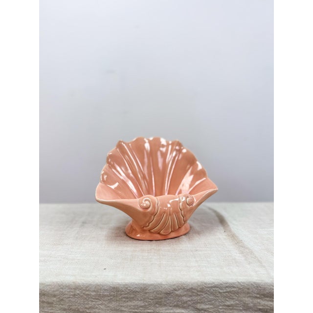 Add a touch of glamour to your home with this vintage pink shell planter by "Pacific", inspired by Hollywood Regency and...