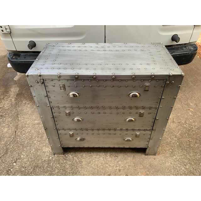unique side table made of aluminum beautiful design and detail I love it because is a very nice piece