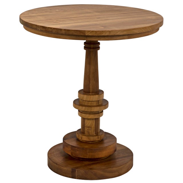 Hand-carved of solid teak, and finished in a soft, burnished gold, this turned side table features a circular base that...