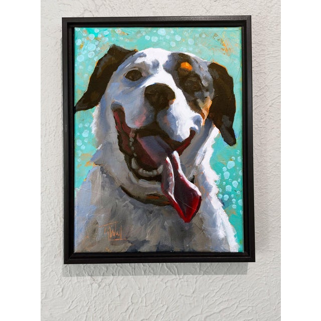 This mixed media piece captures the exuberant spirit of a dog, its joyful expression radiating warmth and playfulness. The...