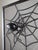 This spark guard represents the handcrafted style of the 1970s, made of wrought iron with a black finish and a metal mesh...