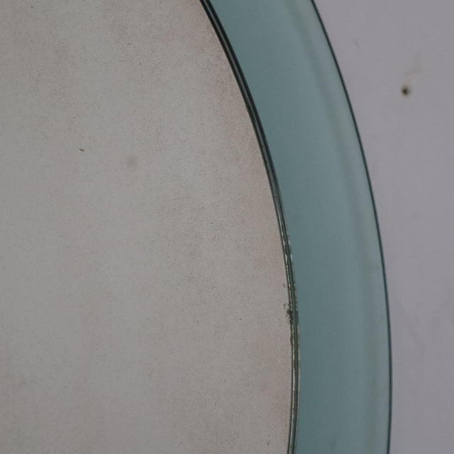 This stunning mid-century round mirror, produced by Veca in Italy in the 1970s, is a fine example of vintage design. The...