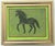 An elegant horse silhouette in shades of army , forest, lime greens with a burgundy and green border border. Realism ,...