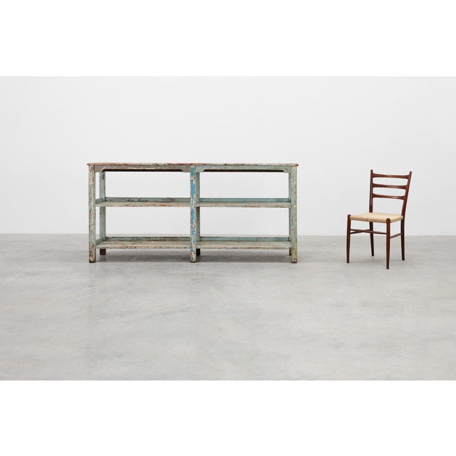 A characterful industrial console from France, dating to around 1900, showcasing the raw honesty and utilitarian charm of...