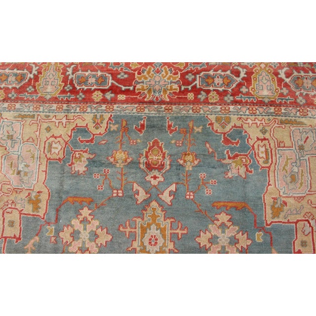 Antique Turkish Oushak Rug on a Blue Background and Orange-Red Color Border For Sale - Image 10 of 12