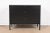 An exceptional Mid-Century Modern black lacquered three-drawer dresser chest By Florence Knoll for Knoll Associates USA,...