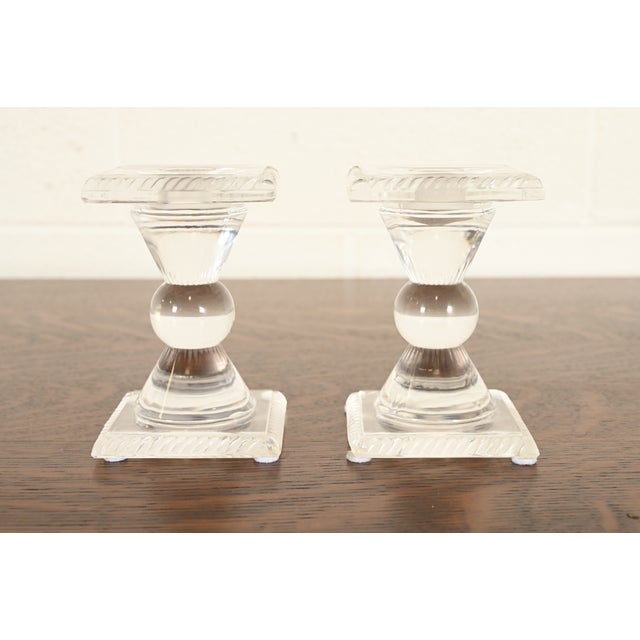 A gorgeous pair of Art Deco or Art Nouveau candlesticks featuring bold, geometric hourglass silhouette with brilliantly...