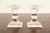 A gorgeous pair of Art Deco or Art Nouveau candlesticks featuring bold, geometric hourglass silhouette with brilliantly...