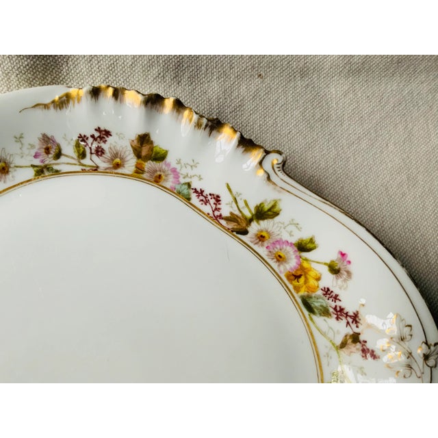 …A magnificent mid-century Charles Field Haviland Limoges serving tray that exemplifies the sophisticated fusion of...