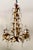 Here is a vintage mid-20th century three-light chandelier featuring sculptural gilt metal foliage and cascading faceted...