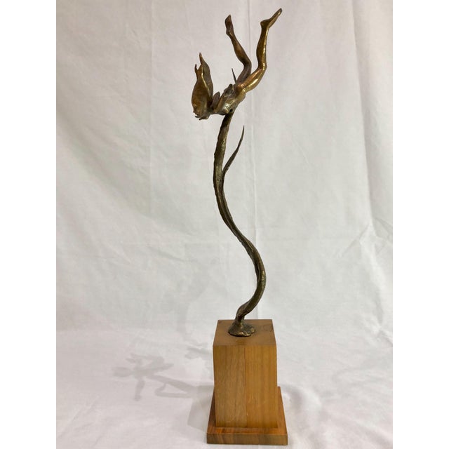 Bronze Mid Century modern sculpture of a diving mermaid creature. The figure is highly detailed and attractive from all...