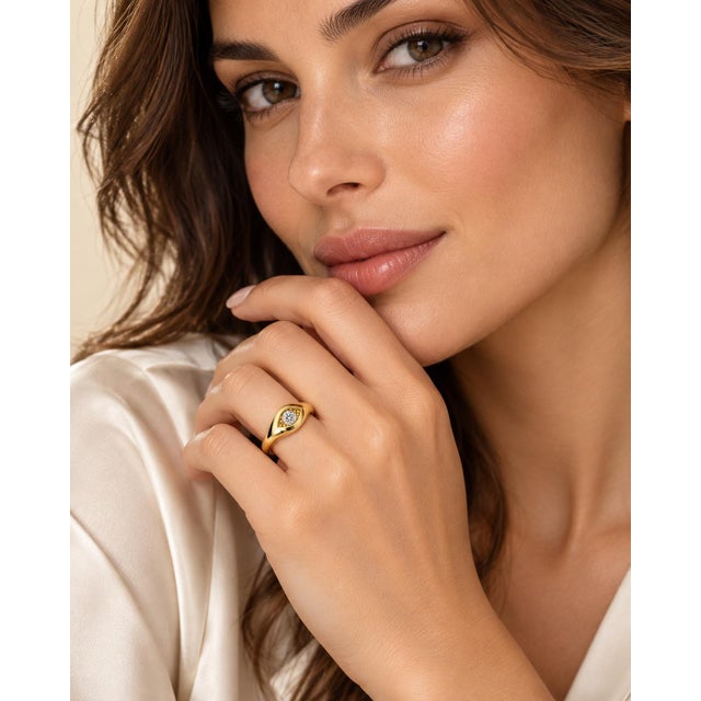 An authentic and substantial vintage statement ring crafted in solid 14k yellow gold, dating from circa 1970. Featuring a...