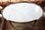 Coffee table from the 1950s, a very special model with a Carrara marble top, the top is bordered by a fine brass border,...