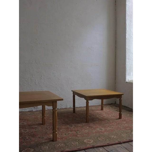 Carved solid oak rectangular coffee table designed by henning kjaernulf in the 1950s. I have several sets of chairs and...