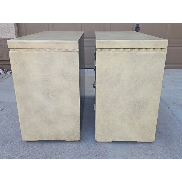 An exceptional pair of large-scale Maitland-Smith faux shagreen bachelor's chests from the 1980s, retaining their original...