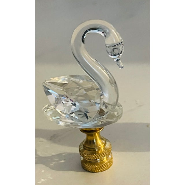 Beautiful cut Crystal swan figurine on brass base as lamp finial.