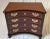 Elegant Mahogany chair side chest. The unique convex front with four drawers with pierced brass Aladdin's lamp pulls. The...