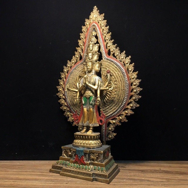 This is an impressive and finely detailed vintage Chinese figure of Thousand-Hand Guanyin , the Bodhisattva of Compassion....