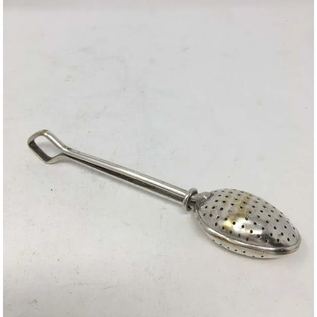 Vintage silver plate tea strainer spoon used for steeping and straining tea. Perfect for the tea Connoisseur or Collector....