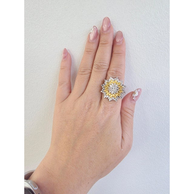 We offer free 2-day shipping! This is a diamond cut gold 3 layer sunflower ring in 18karat 2 tone gold. Circa 1980's...