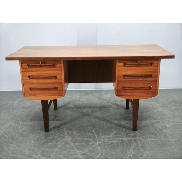 Impressive danish modern executive desk designed by j. Svenstrup and produced by a.p. Møbler in denmark during the 1960s....