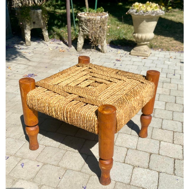 Elegant vintage stool attributed to Audoux-Minet, a renowned French design duo of the 1950s, celebrated for their use of...