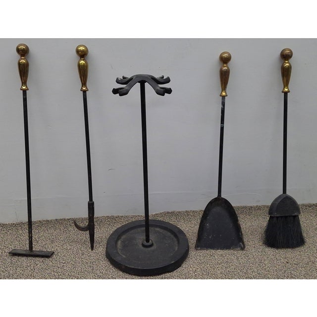 A five piece American Ball Brass Handle and Iron Fireplace Tools Set Stands 23" tall. Ball handle tool set Individually...