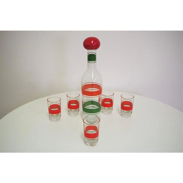 Set bottle and glasses for liqueur of the 60s glasses measure: h8 x d5 bottle measures: h29 x d8.