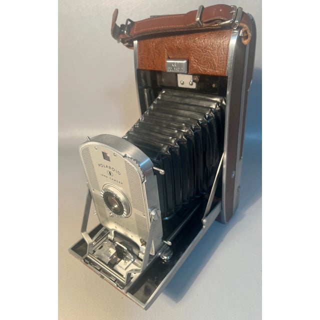 We purchased this original, 1951, Polaroid Model 95B instant camera from the original owner. He assured us that it was in...
