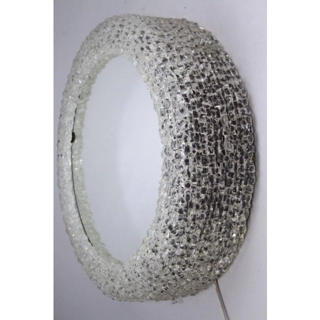 This illuminated mirror is equipped with 6 E27 sockets. The frame is made of acrylic glass. I have official proof of...