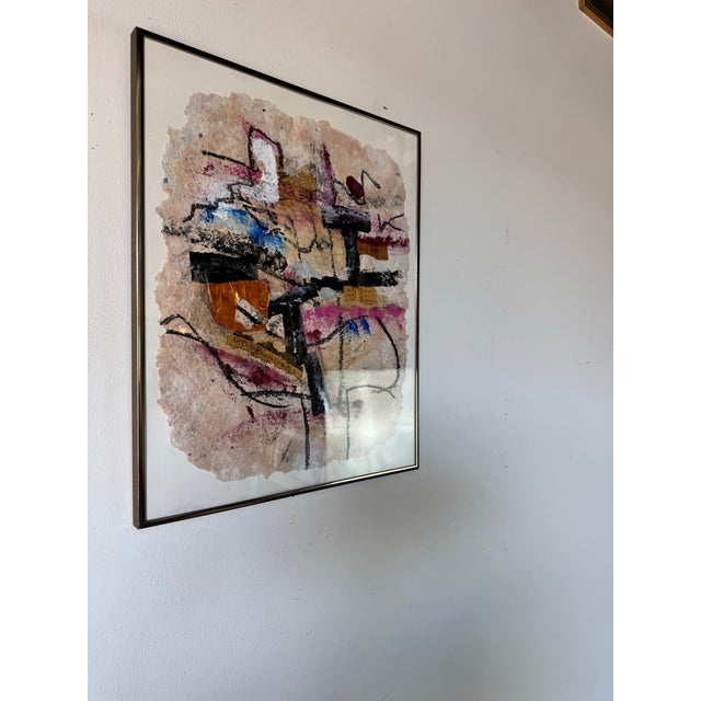 This striking 1980s vintage mixed media abstract expressionist painting is a bold exploration of color, texture, and form....