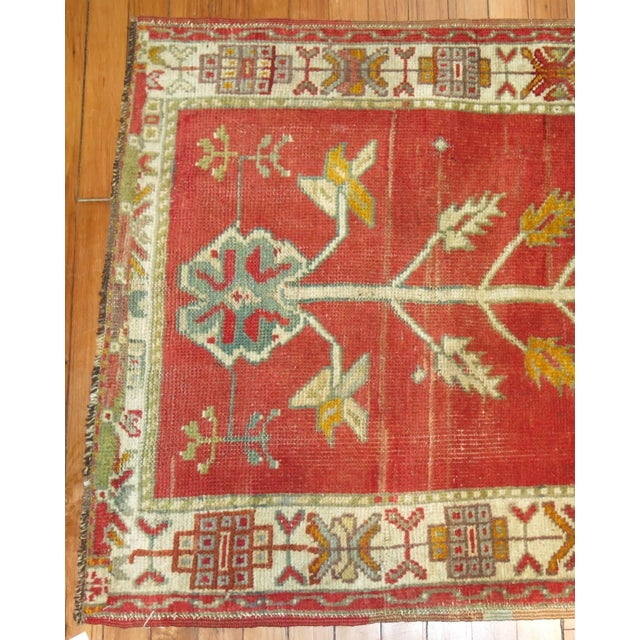 20th century antique Oushak prayer rug in red and green. 2'9'' x 3'5''