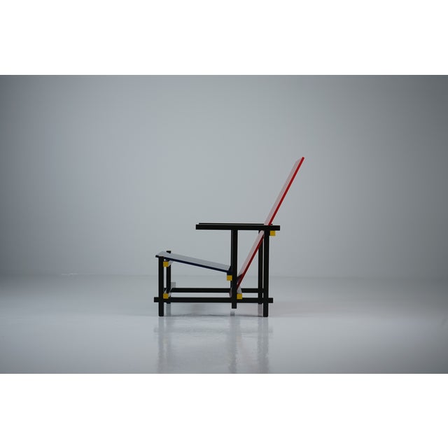 Red and Blue Armchair by Gerrit Thomas Rietveld (June 1988 – June 1964) for Cassina. The iconic Red and Blue Armchair is...