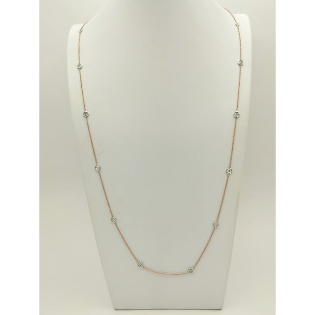 This is part of Chairish’s Fine Jewelry assortment. Beautiful bezel diamond necklace with 0.34 ct. good quality white...