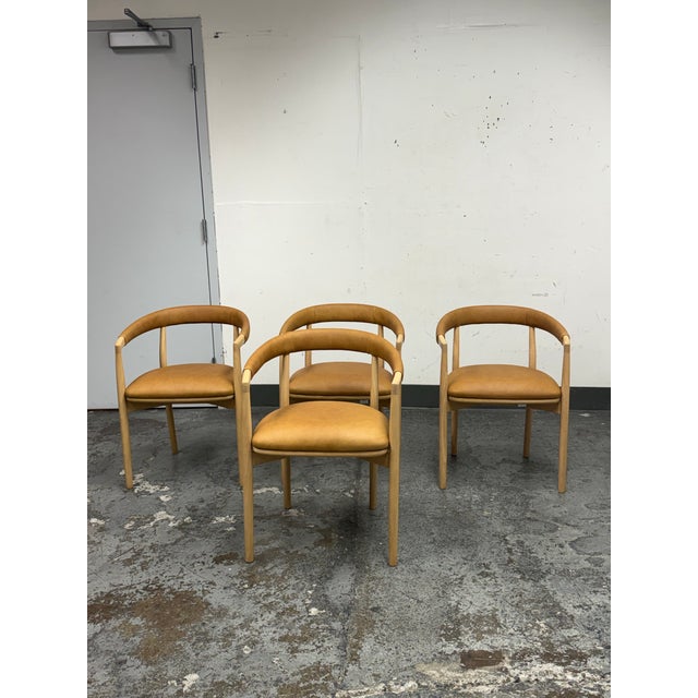 Design Plus Gallery presents a Set of Four Irvine Leather Dining Chairs from West Elm. Designed to bring a clean, modern...