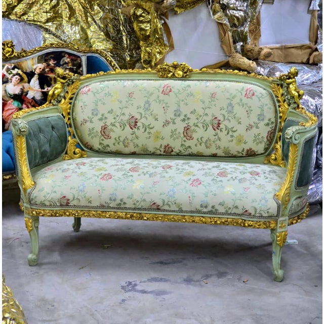 Experience the romance and elegance of classic French design with this breathtaking Louis XV-inspired sofa, exquisitely...