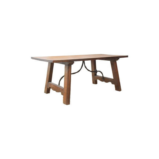 great walnut Spanish coffee table with the iron stretch bar underneath. 17th century Spanish style table from the early...