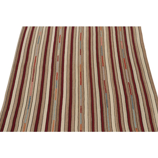 This vintage 7x8 Persian kilim is handwoven in wool, and originates circa 1950-1960. On the Design: Coming from the...