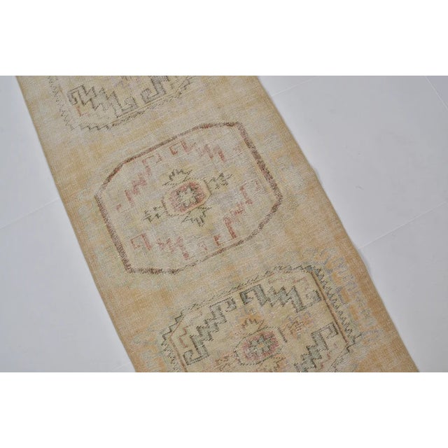 1960s Vintage Anatolian Wool Runner, Light Beige Field With Subtle Tonal Medallions For Sale - Image 5 of 10