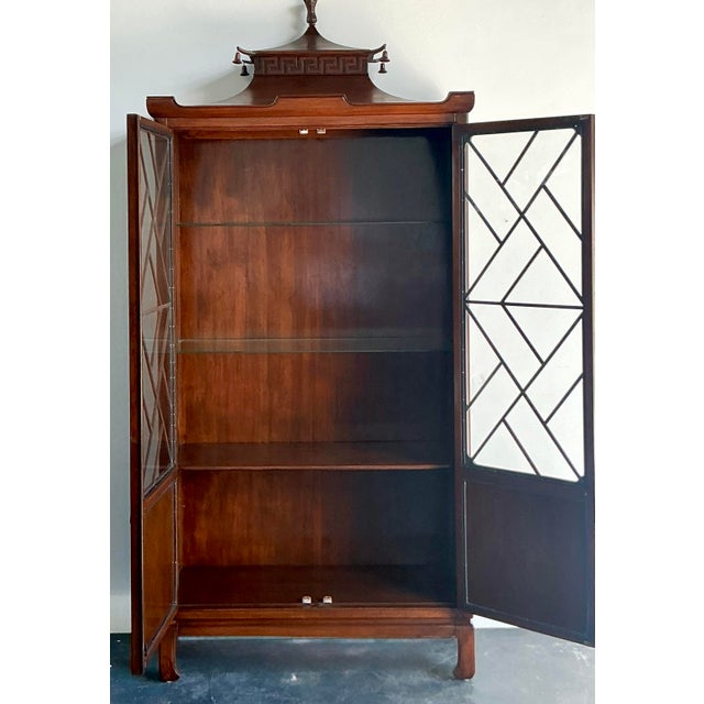 This magnificent vintage pagoda cabinet by Tomlinson represents the pinnacle of Mid-Century Chinoiserie design. Known for...
