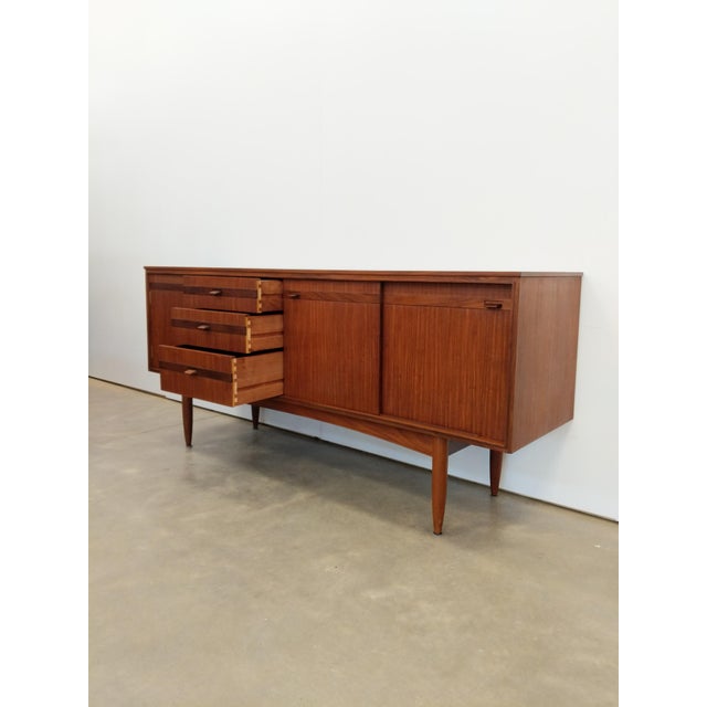 Authentic vintage mid century modern teak credenza / sideboard / console. "Edenfield" model by White & Newton (unmarked)....