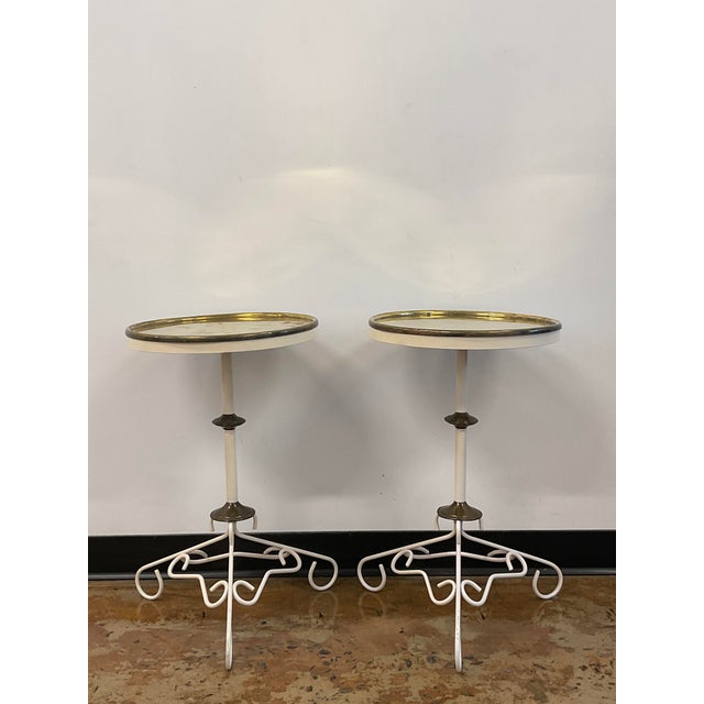 A wonderful pair of vintage mid-century brass tray top side tables/ martinin tables, with decorative wrought iron brass...