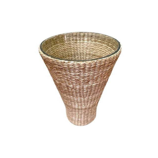 This vintage vase combines natural rattan weave with delicate blown glass, providing a rustic yet refined aesthetic for...