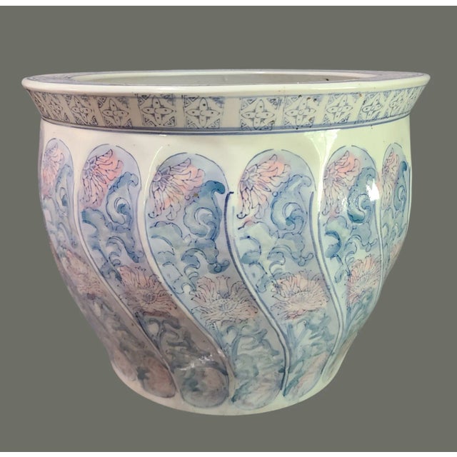 This Vintage Asian Floral Large Fish Bowl Jardinière Planter is a beautiful decorative piece that adds a touch of elegance...