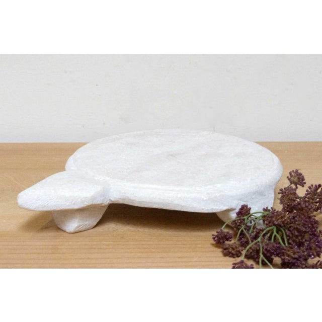 Crafted from pure white marble, these charming chapati plates add a touch of global flair to your home. Originally used in...