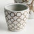 Classic chinoiserieinspired coordinating patterns in taupe andWhite. In design, taupe is often associated with muted,...