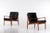 Pair of Svend Aage Eriksen easy chairs, produced in Denmark during the 1960s. Teak frame and black leather cushions. This...